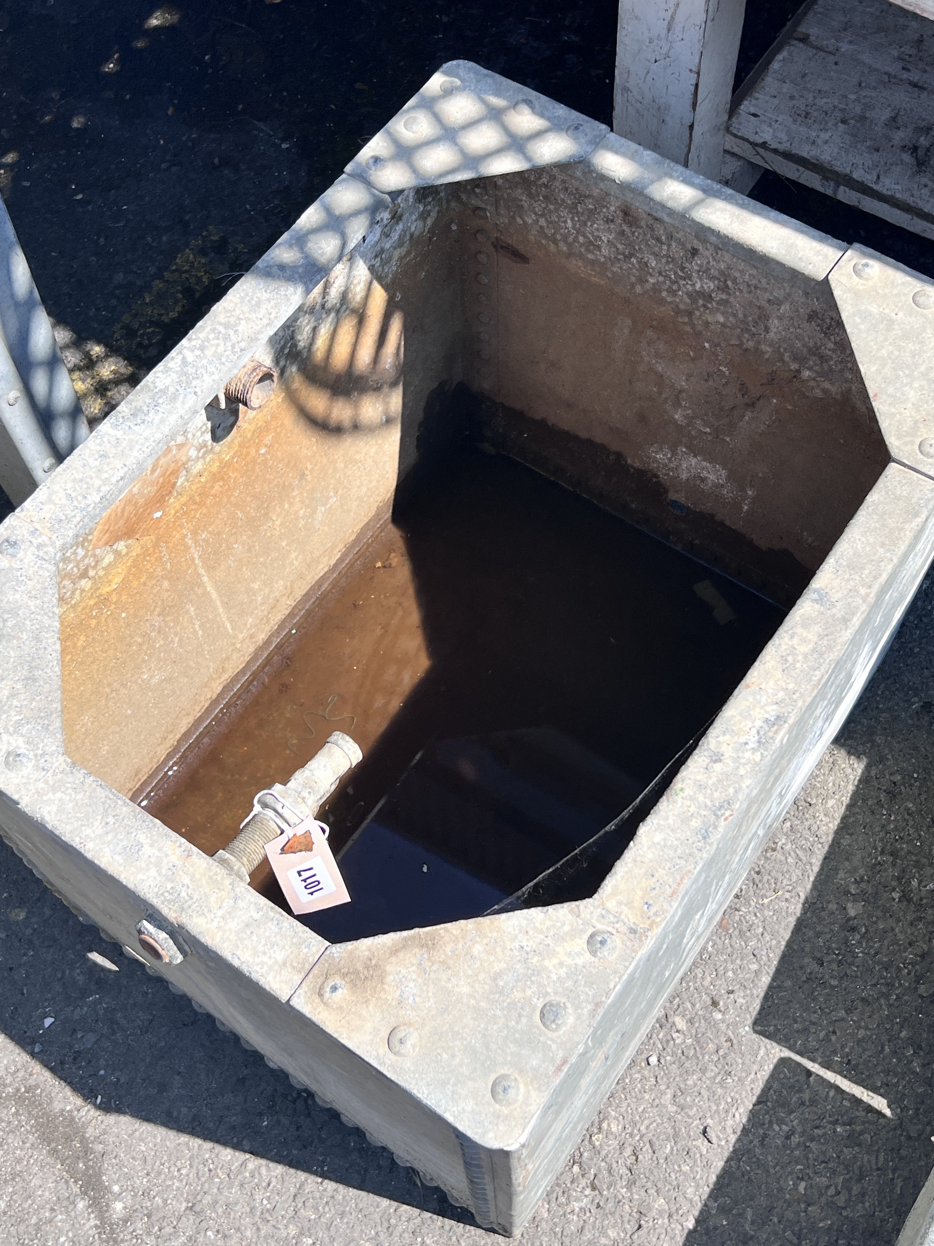 A rectangular galvanised water tank, width 60cm, depth 46cm, height 47cm